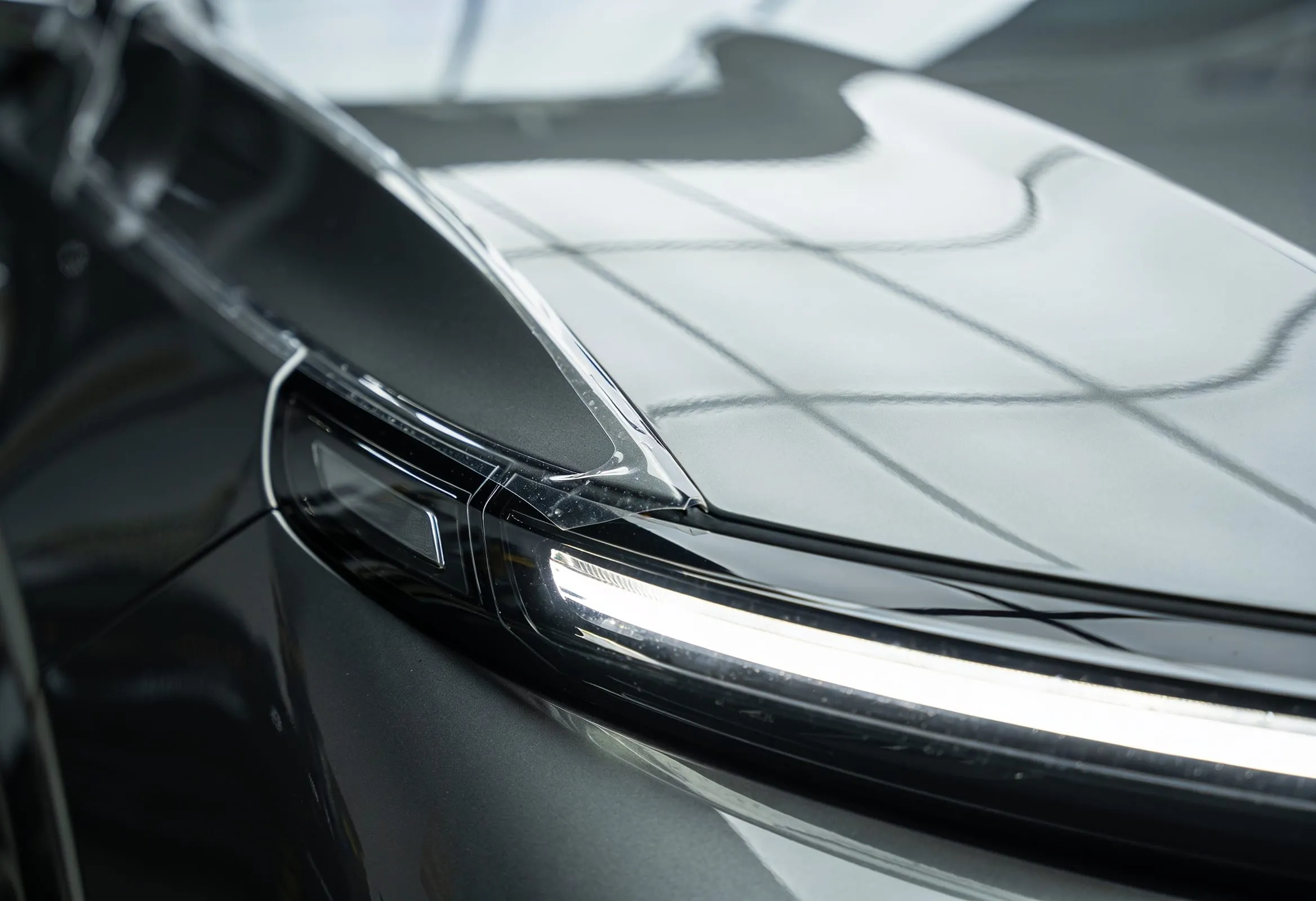 Vinyl Wrapz paint protection film install - the film edge wraps the panel completely and is invisible