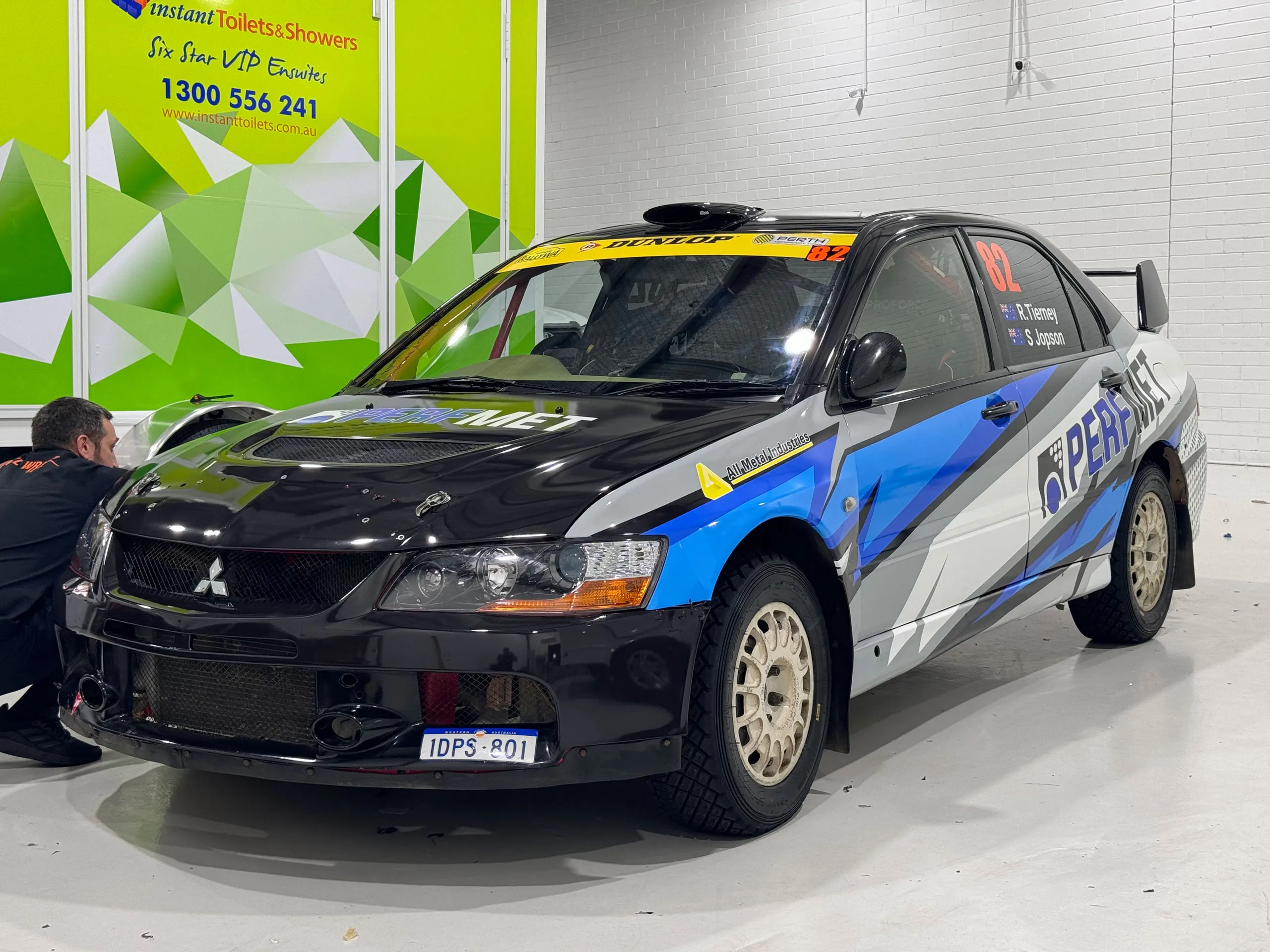 Custom rally livery on a Mitsubishi Evo IX