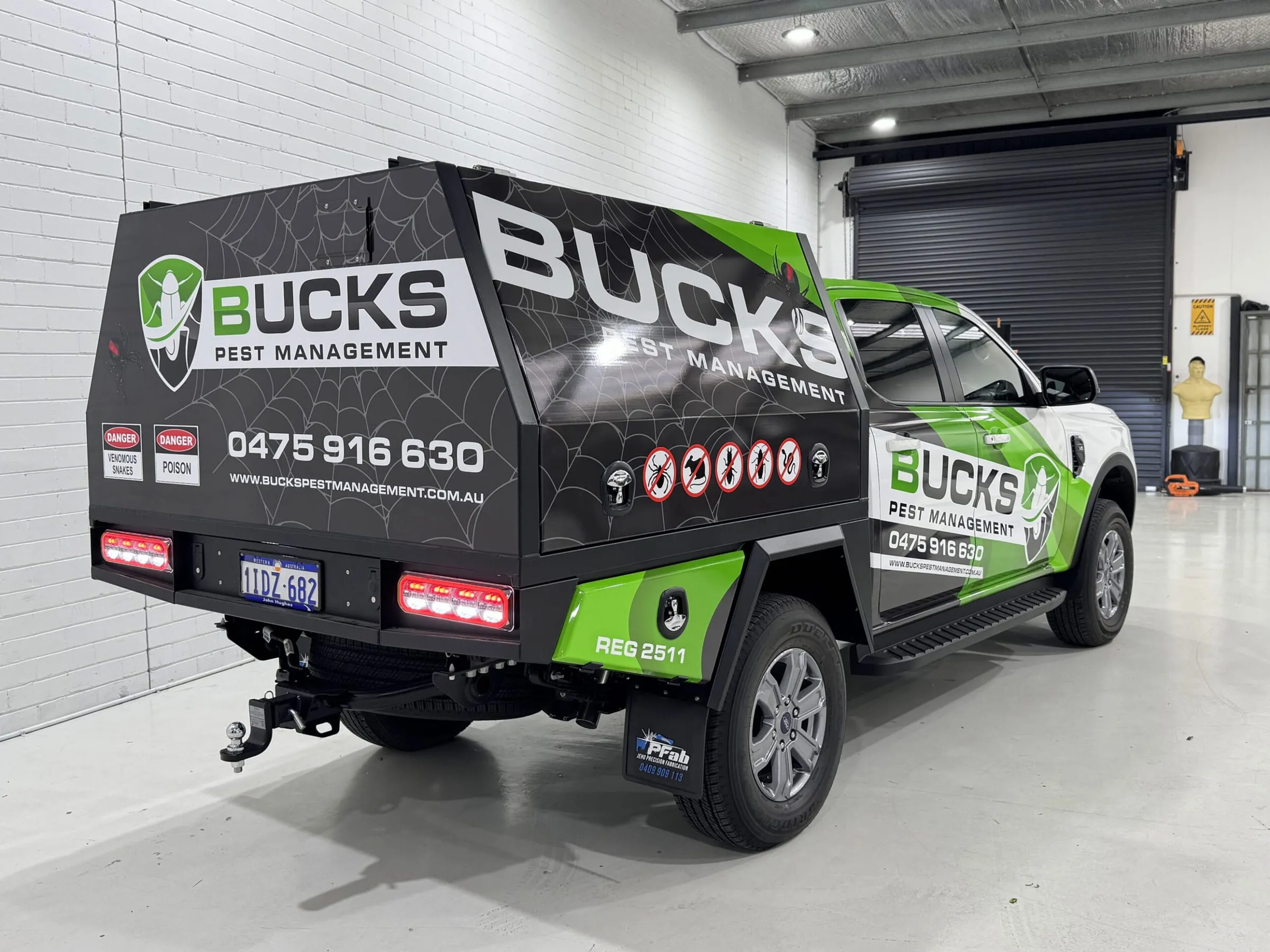 Ford Ranger with partial wrap and branded canopy for a Perth pest management business